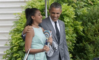El presidente Obama abrazando a su Hija