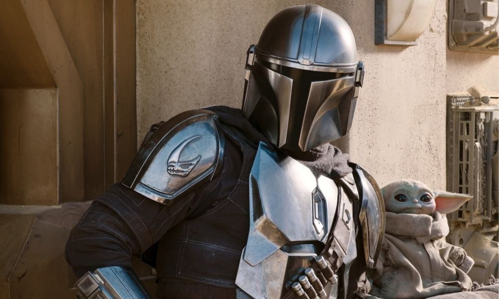 Mando y Grogu en unas películas de 'Star Wars'